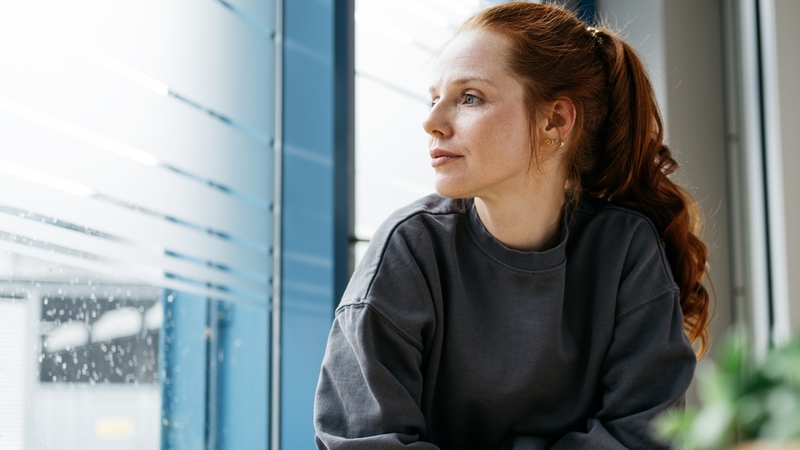 Women with ADHD and anxiety staring outside