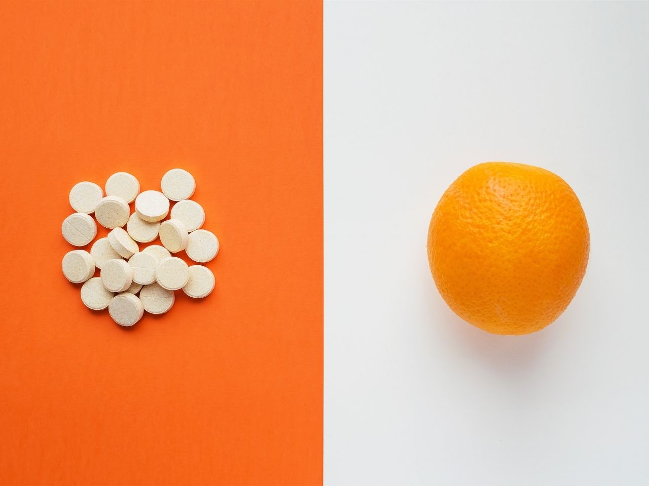 Some treatment medication and orange on a desk
